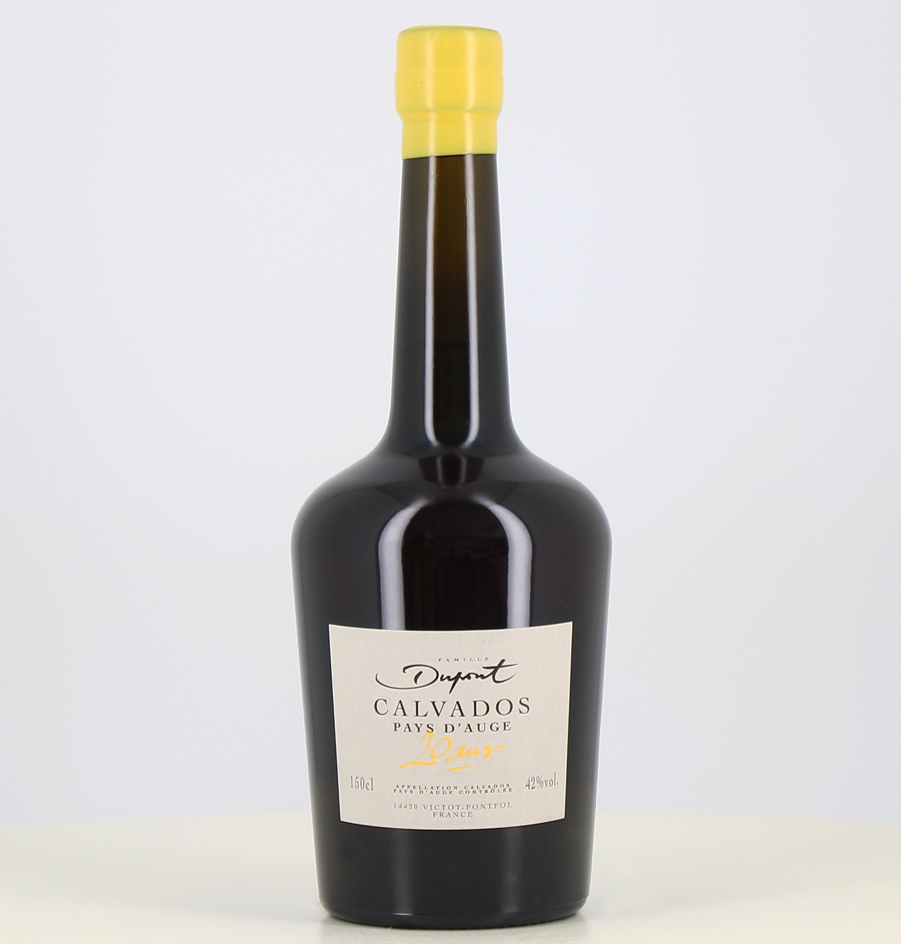 Magnum calvados Pays d'Auge Dupont 20 ans 42°

This translates to:
Magnum calvados Pays d'Auge Dupont 20 years old 42° 